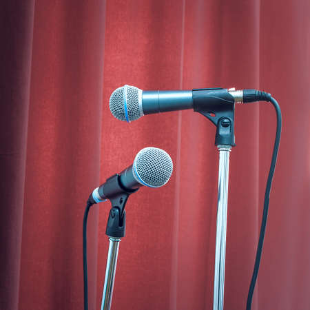 two microphones on the stageの写真素材