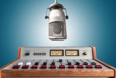 Professional microphone and sound mixer in radio station studio