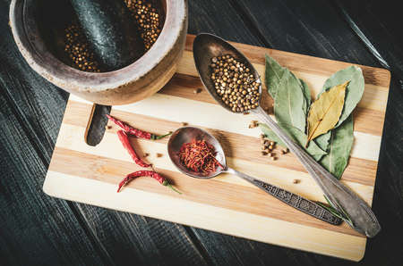 mortar and spices on a cutting board