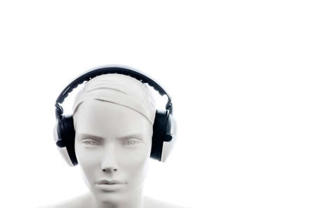 background with mannequin head in headphonesの写真素材