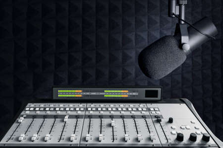 Professional microphone and sound mixer in radio station studio