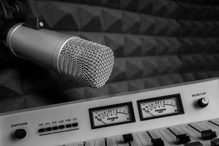 Professional microphone and sound mixer in radio station studio