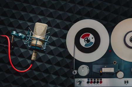 Professional microphone and vintage tape recorderの写真素材