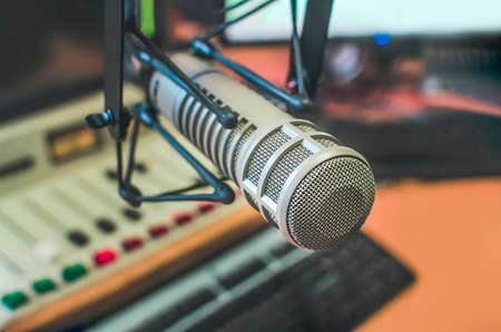 Professional microphone and sound mixer in radio station studioの写真素材