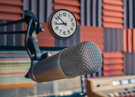 Professional microphone and sound mixer in radio station studioの写真素材