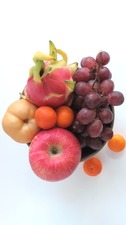 dragon fruit,grapes,orange,apple,pearの写真素材