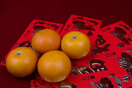 Chinese Tradition on New Year, Orange and Red Envelope with Chinese Script  FU means Lucky , 
They...