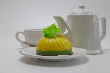 Jelly pudding and tea pot on white background, Japanese dessert.の写真素材