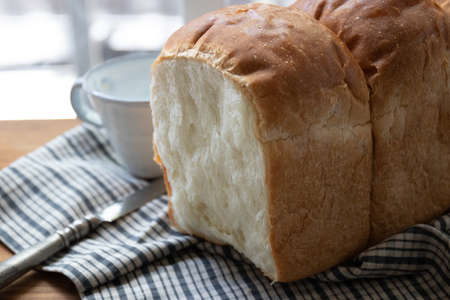 sliced of home made white bread, fresh from  oven