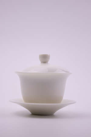 White Chinese Tae Cup on White Backgroundの写真素材