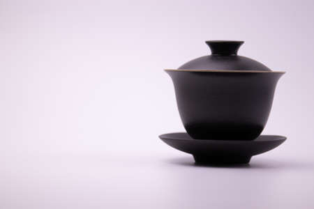 Black Chinese Tea Cup on white backgroundの写真素材