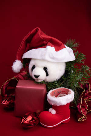 Panda Plush Doll Wearing Red Santa Claus Hatの写真素材