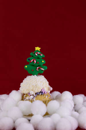 Christmas Celebration.
Christmas Cup Cake on Blue Backgroundの写真素材