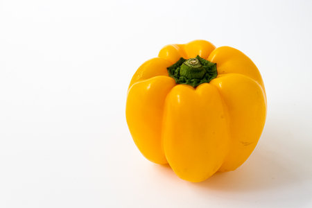 Yellow bell pepper isolated on white background, Capsicum annuum.の写真素材