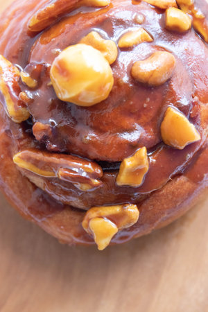 Tasty Dessert, Brioche with caramelized Nuts on white background