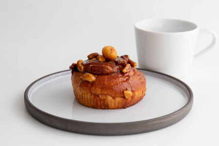 Tasty Dessert, Brioche with caramelized Nuts on white backgroundの写真素材