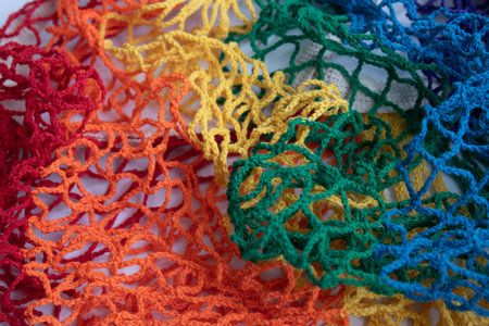 Multicolored lace on a white background. Close-up.の写真素材