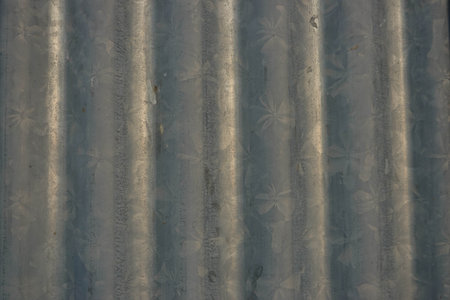 Corrugated zinc sheet texture for background, closeup of photo