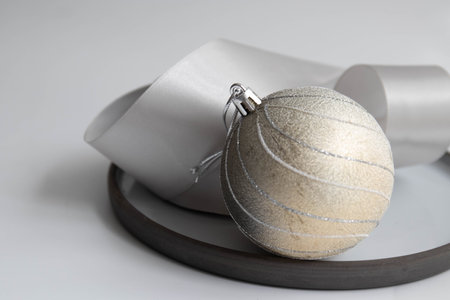 Silver Satin Ribbon and Silver Christmas Ball Hangingの写真素材