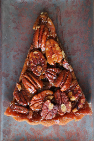 Close up Pecan pie on Rustic Plate and Rustic background