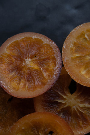 dried Orange slices on black background, top viewの写真素材