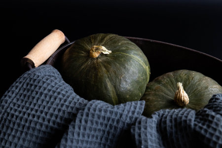 2 pumpkins on black backgroundの写真素材