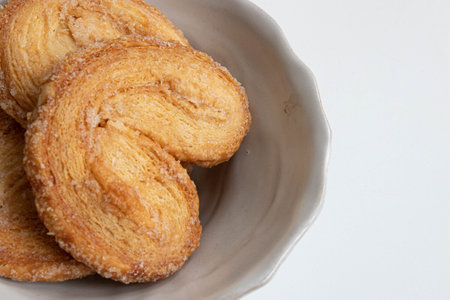 Close up Traditional French pastry , Palmiers, on Black backgroundの写真素材