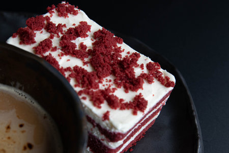 Classic red Velvet cake on Black background