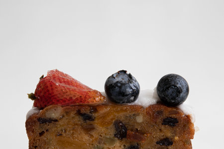 Strawberry and blueberry cake isolated on a white backgroundの写真素材