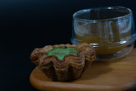 Delicious Danish Pastry on a White Plate, Black Background