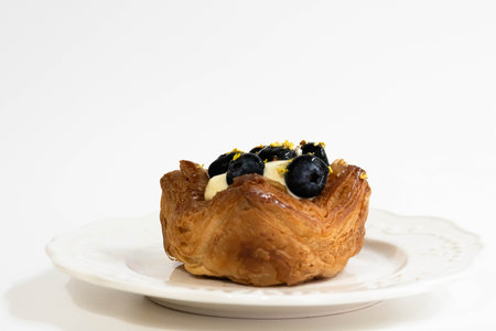 Delicious Blueberry Pastry on a White Plate, White Background