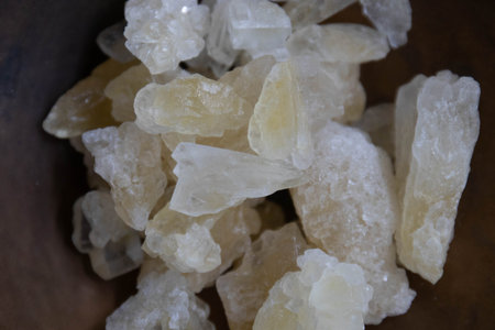 Granulated substance in a bowl, closeup of photo