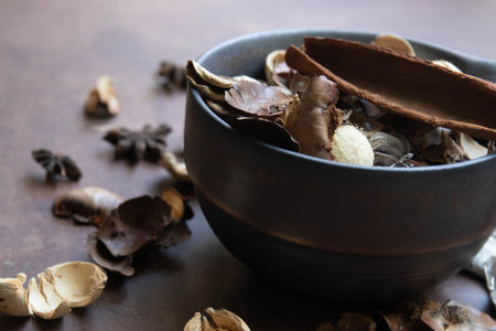 Autumn Concept, The ingredients in the bowl include cinnamon sticks and star anise, which are common...