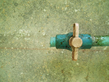 water valve and green mold の写真素材