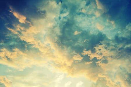 dramatic blue ,brown and gray sky backgroundの写真素材