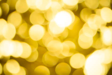 Gold ,yellow and white bokeh  for festival backgroundの写真素材