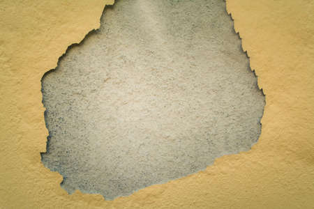 crack brown wall  and gray space backgroundの写真素材