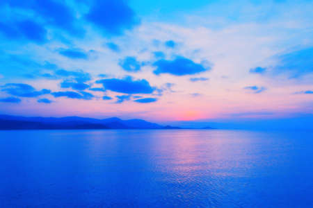 soft focus sunset blue sky pastel  at sea  backgroundの写真素材