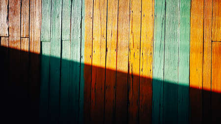 Vintage brown and green color wooden wall texture backgroundの写真素材