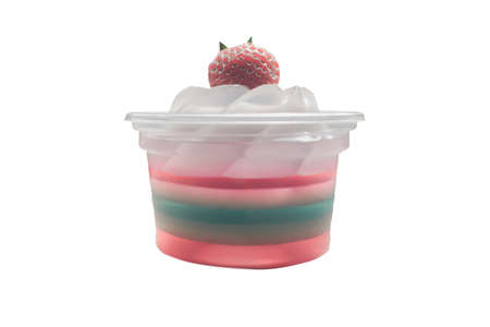 isolate rainbow jelly with fresh strawberry on white backgroundの写真素材