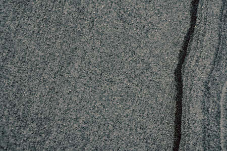 gray and black grain stone wall texture background