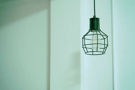 the lamp on white  wall analog film  tone color style  の写真素材
