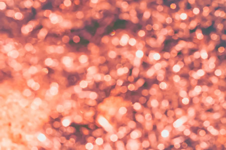 orange , peach color bokeh light background for designの写真素材