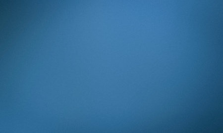 simple blue grainy texture backgroundの写真素材