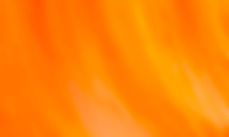 abstract orange background texture with some smooth lines and spots in itの写真素材