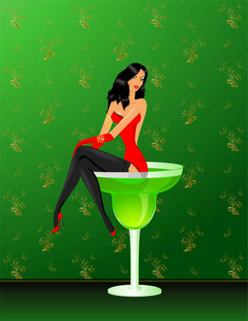 The beautiful harmonous sexy girl sits in a glass with a cocktailの写真素材