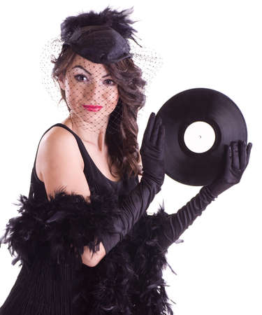 Sexy young woman in retro style with vinyl plate isolated on white background.