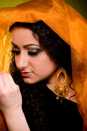 Beautiful young woman in color arabian clothesの写真素材