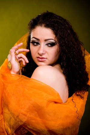 Beautiful young woman in color arabian clothesの写真素材