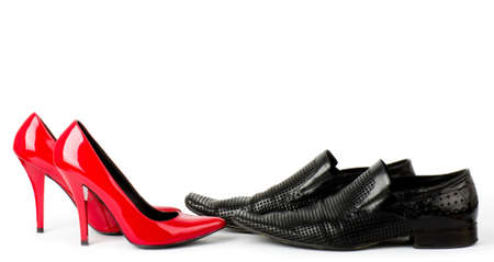 Fashionable male and female shoes isolated on white background の写真素材